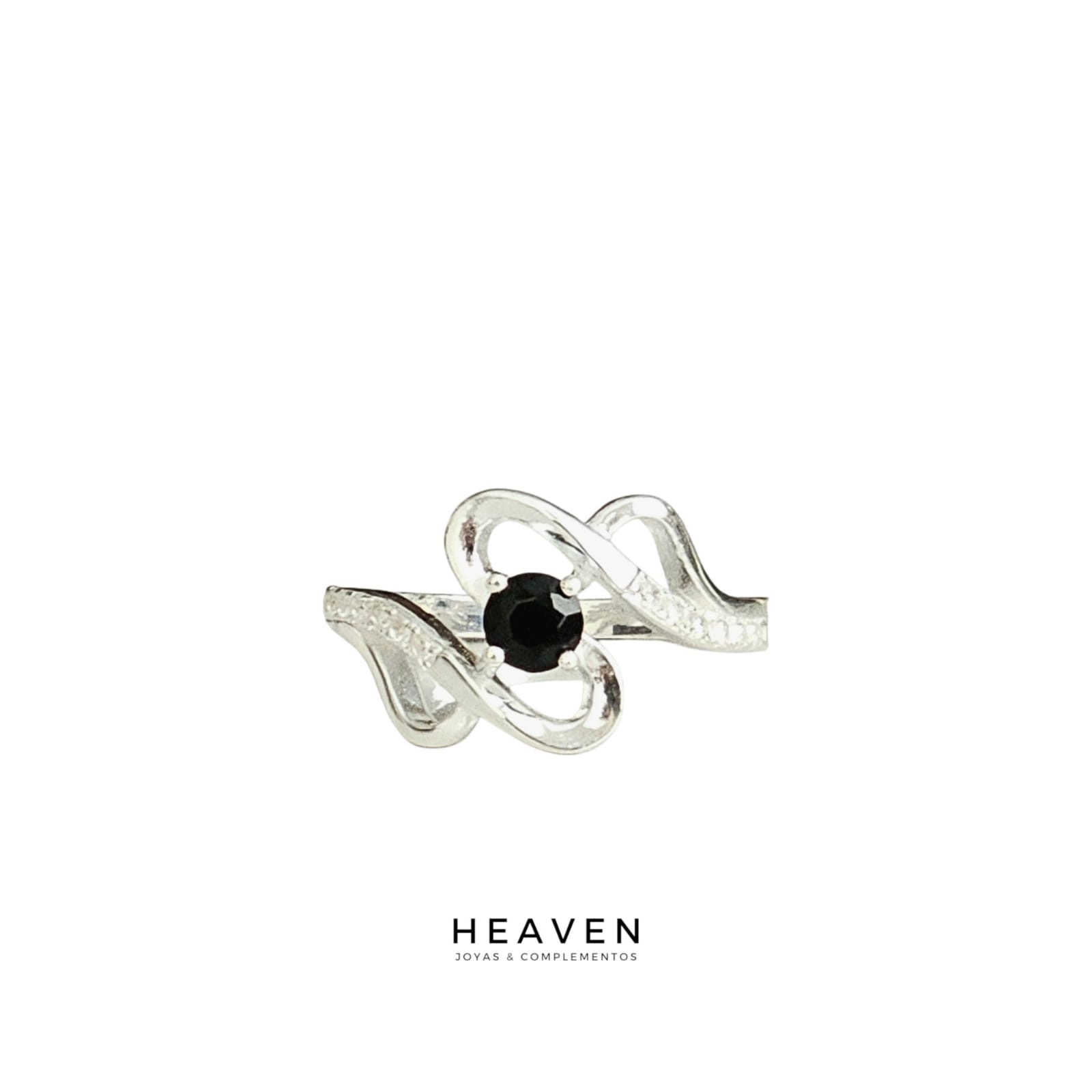 Anillo en plata. Zirconias blancas y negra