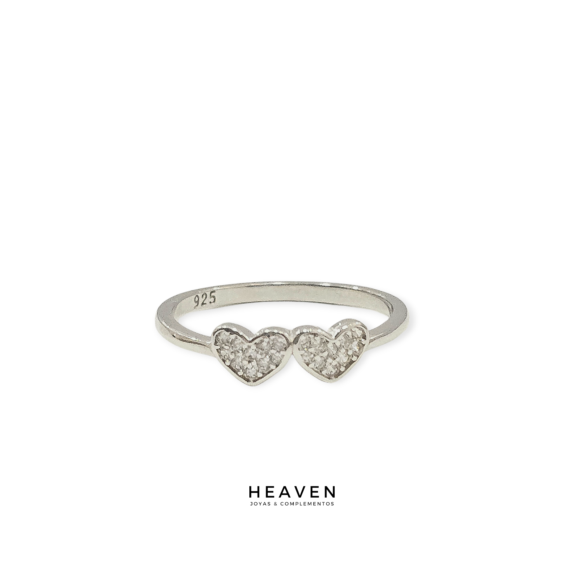 Anillo en plata. Dos corazones con zirconias blancas
